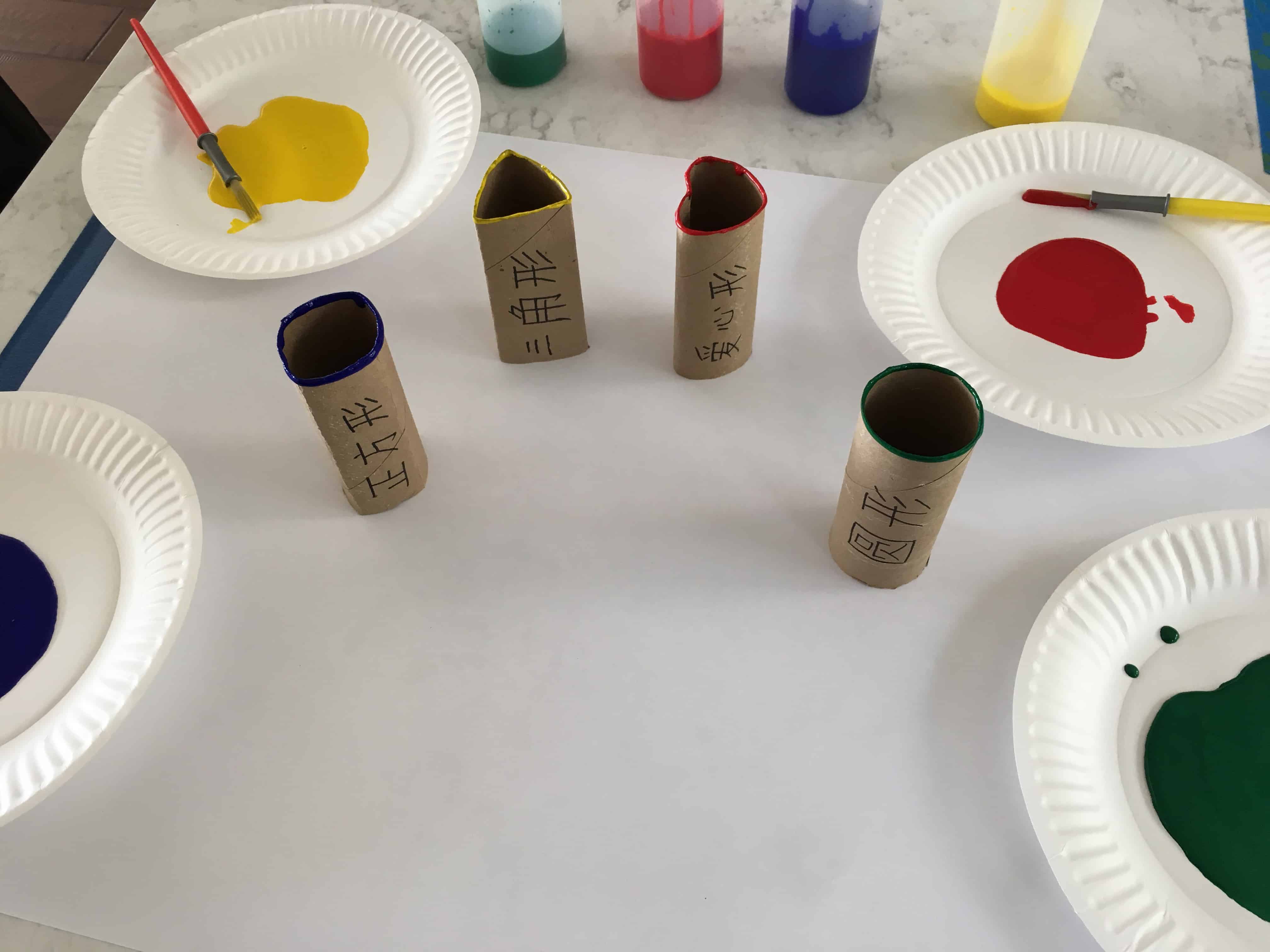 Paper roll shape stamping - recycled learning activity for kids