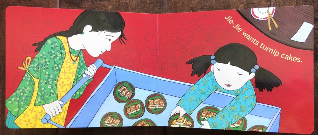 Grace Lin Bringing in the New Year board book for toddlers - picture of a Chinese American girl reaching for turnip cakes, a popular Chinese New Year food.