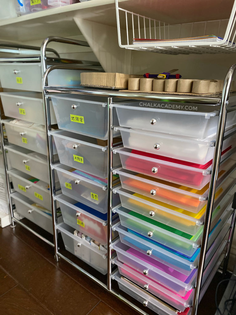 Montessori homeschool storage containers - rolling cards and transparent bins for organization