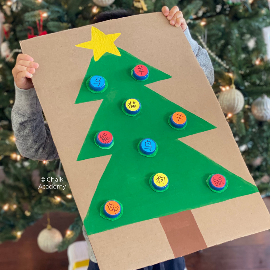 Recycled DIY Christmas tree activity for kids with cardboard and bottle caps