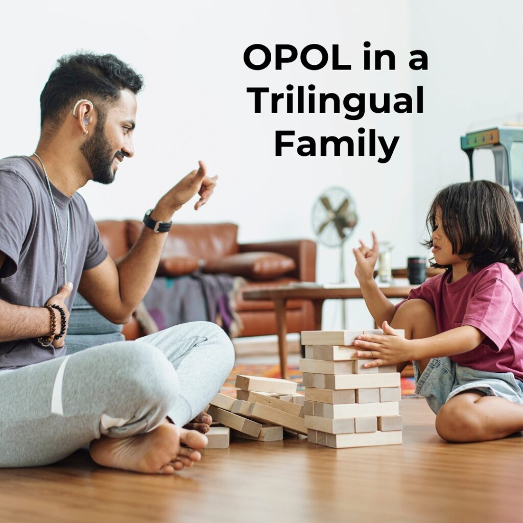 dad teaching child with one person one language OPOL method in a trilingual family